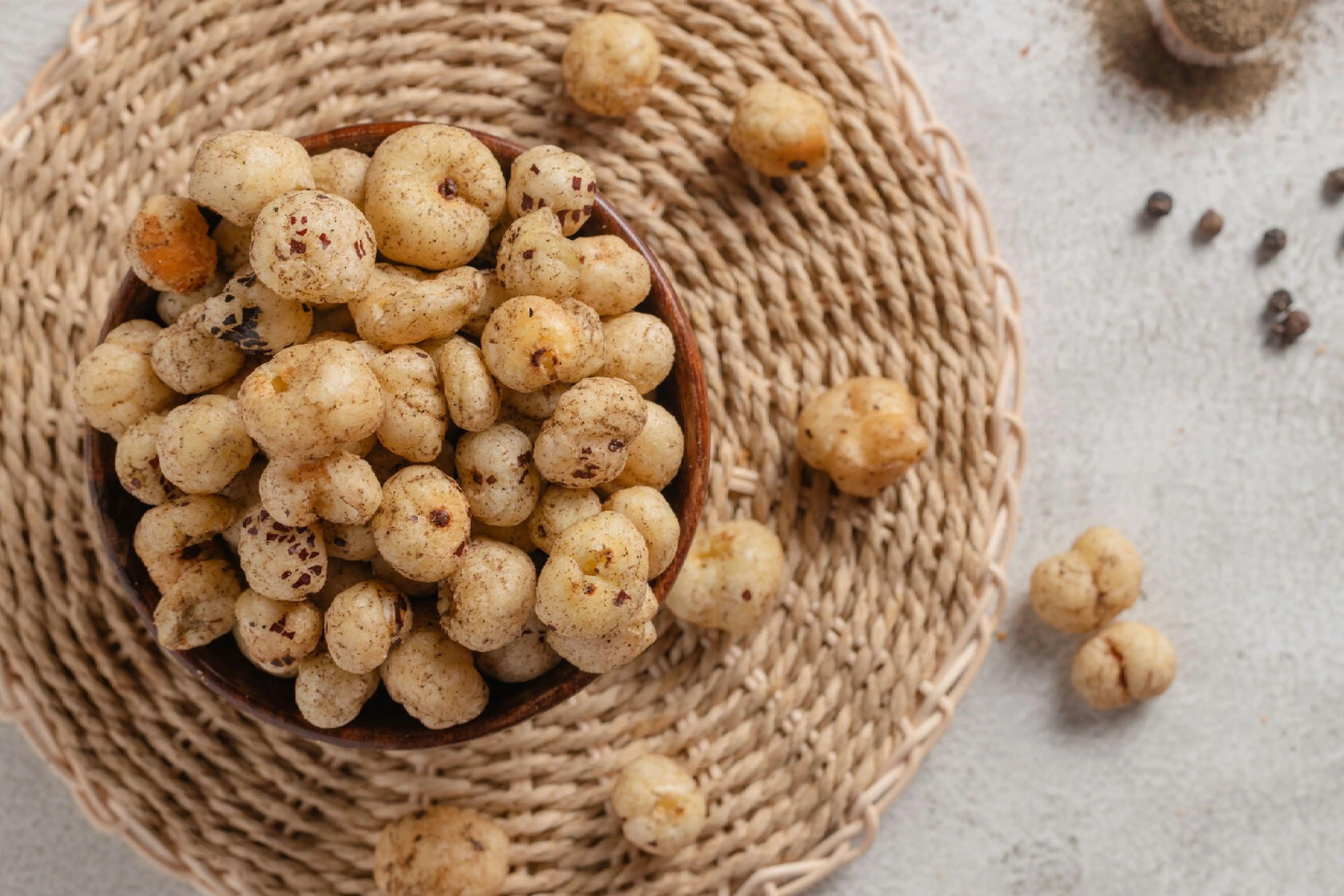 Buy Black Pepper Makhana online from World of Mysore Pak. A flavorful and light foxnut snack.