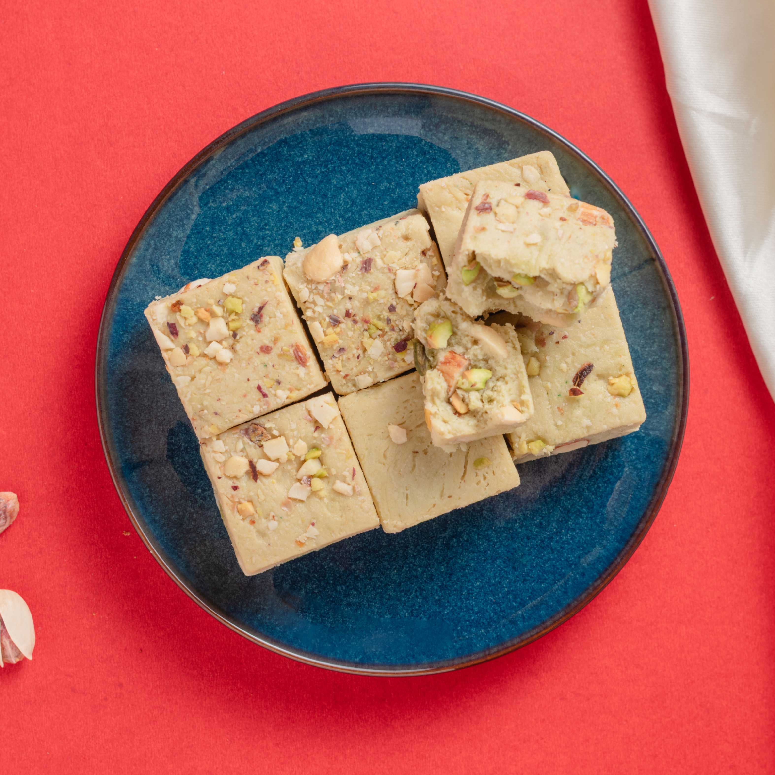 Buy Pistachio Bites online from World of Mysore Pak — crunchy, nutty delights with kaju paste and pure ghee.