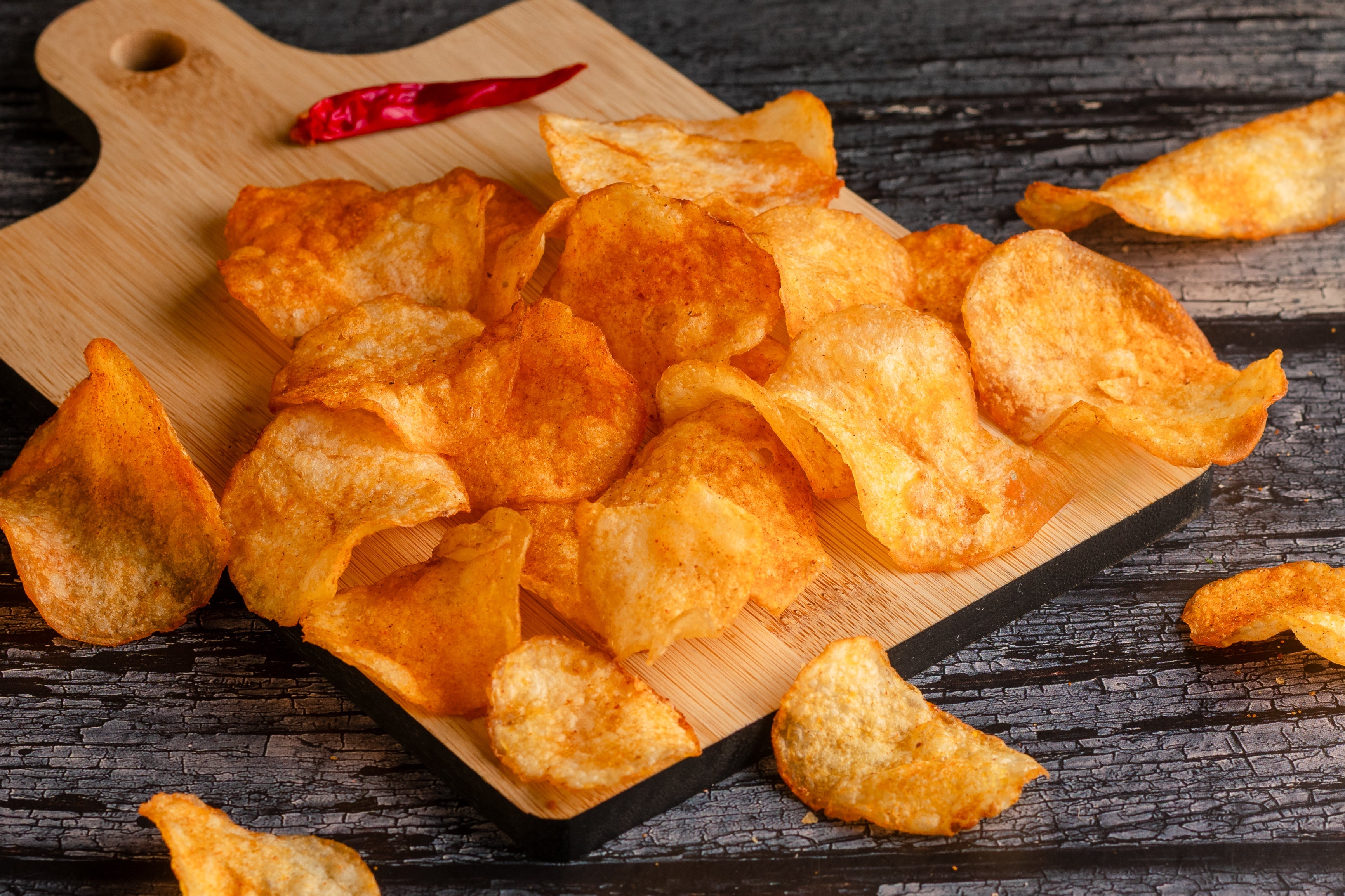 Buy Spicy Aloo Chips online from World of Mysore Pak. Crispy masala chips made with golden potato slices.