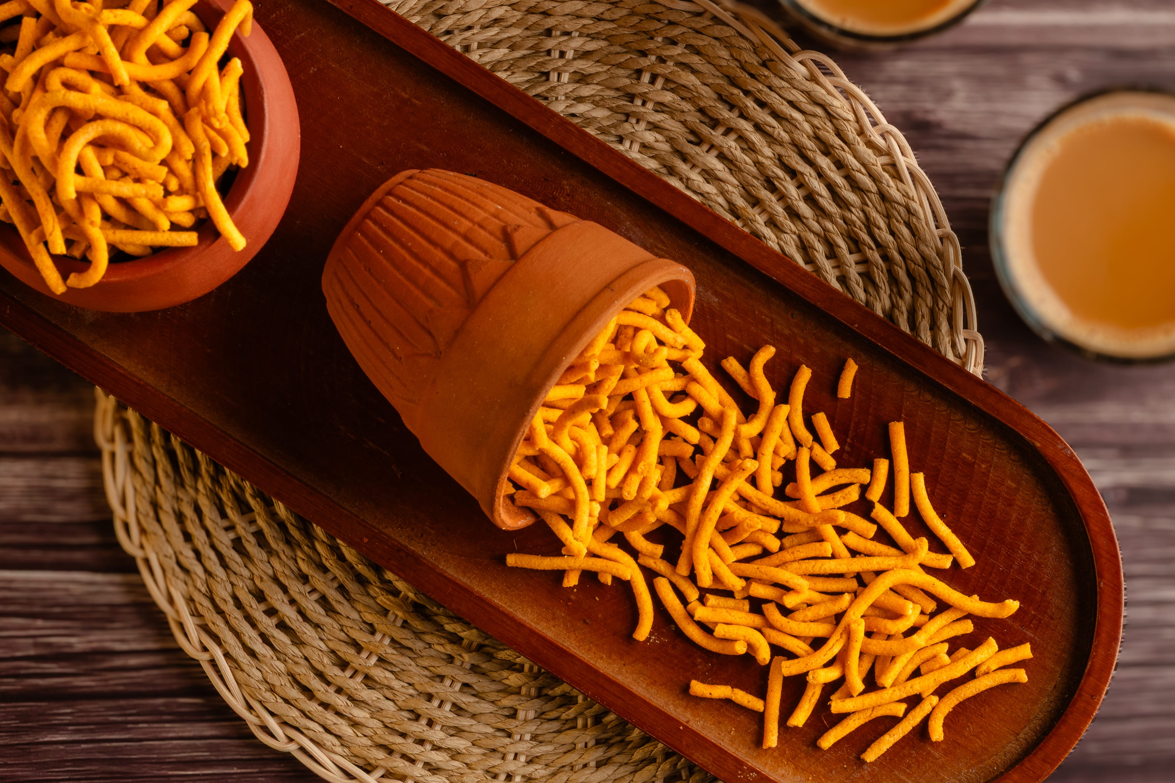 Buy Omapodi mixture online from World of Mysore Pak. A spicy, crunchy blend made with hing, red chilli and gram flour.