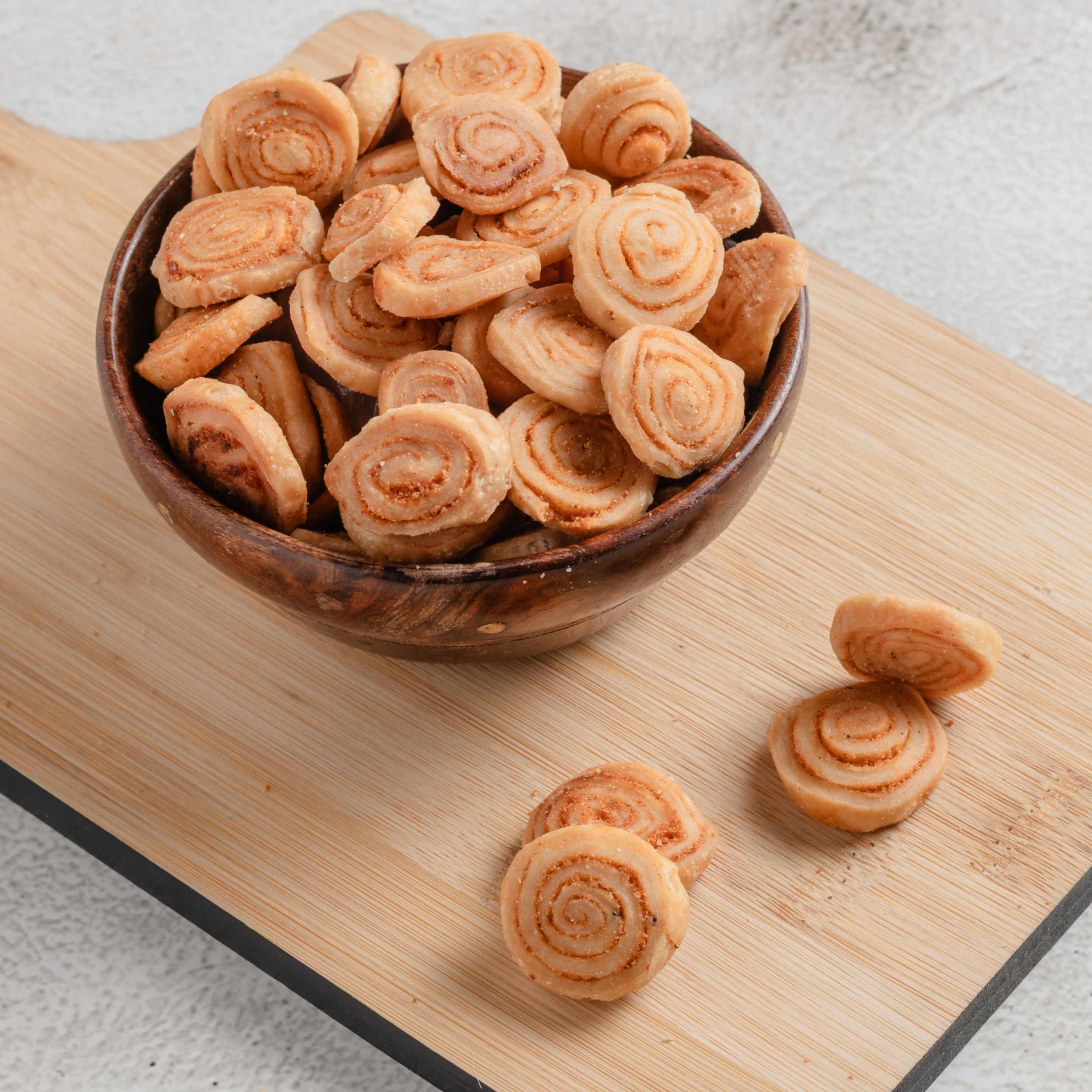 Buy Bhakarwadi dish online from World of Mysore Pak – flavorful snacks with irresistible crunch in every bite.