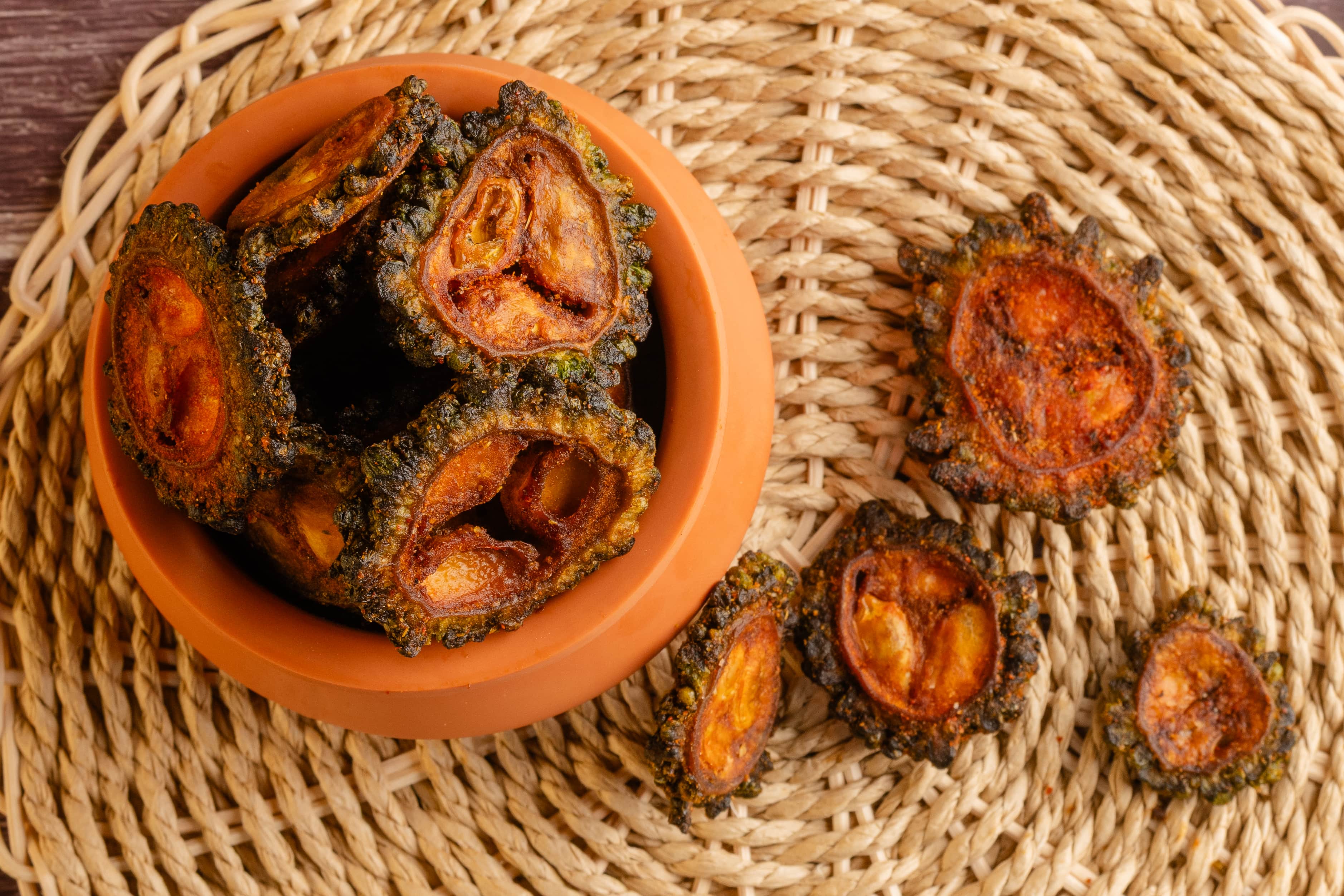 Buy bitter melon chips online from World of Mysore Pak. Bold, crunchy slices of hagalakayi with a satisfying texture.