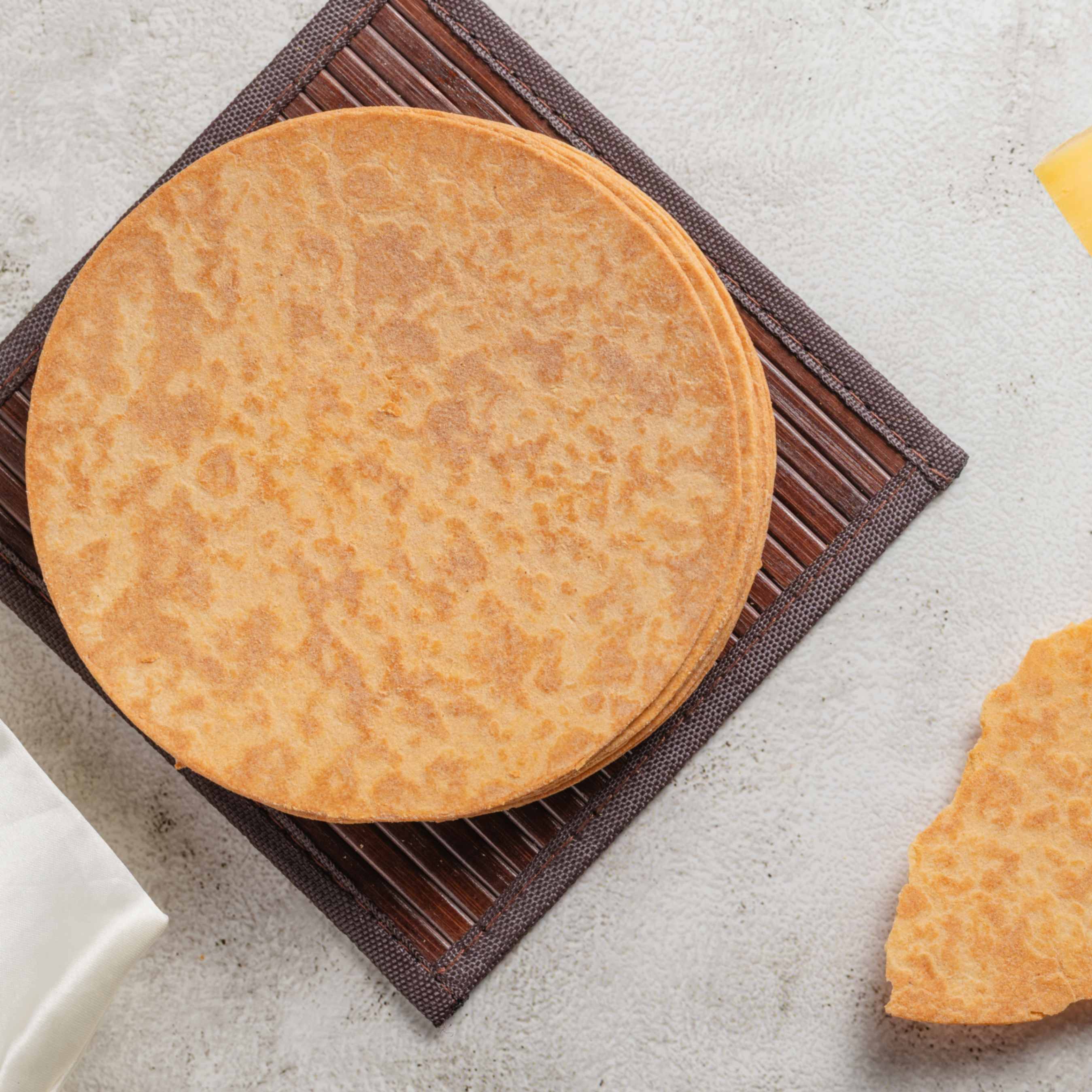 Buy Cheesy Indian Khakhra online from World of Mysore Pak. A snack for cheese lovers craving flavor-packed crispiness.