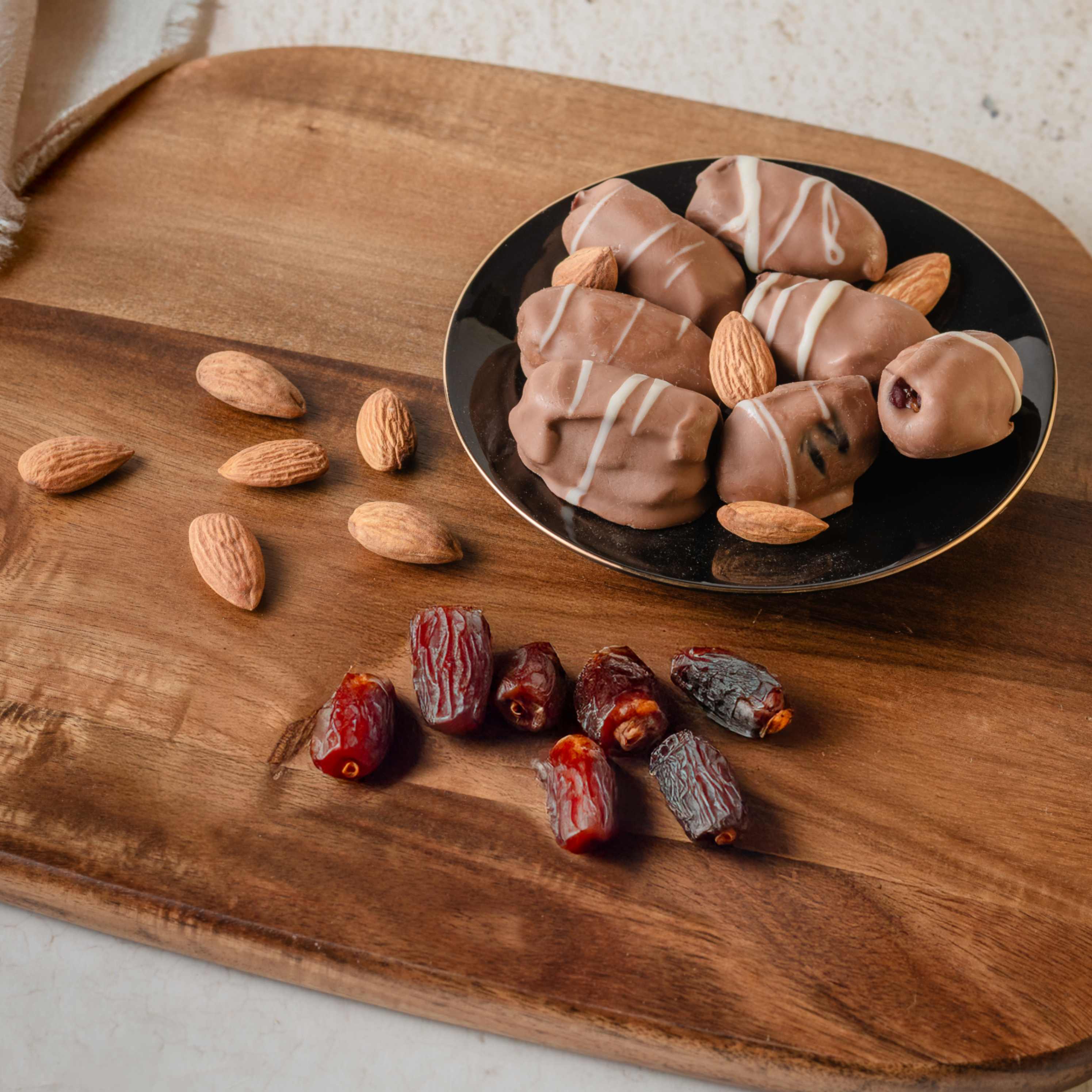 Buy chocolate coated dates with soft textures and bold flavor—get your choco-almond fix online from World of Mysore Pak.