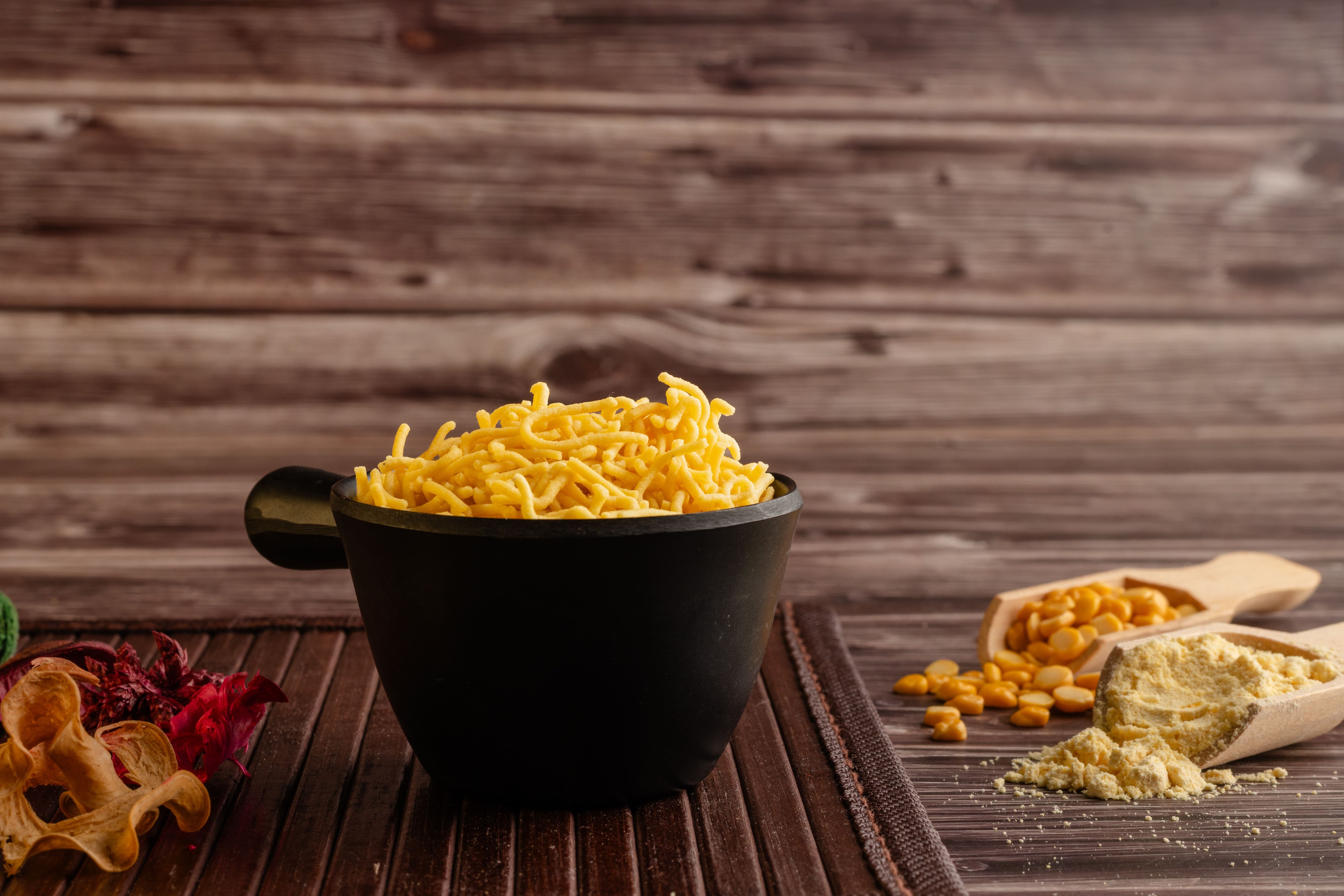 Buy Sev online from World of Mysore Pak. A light and crispy snack made with gram flour, perfect for anytime munching.