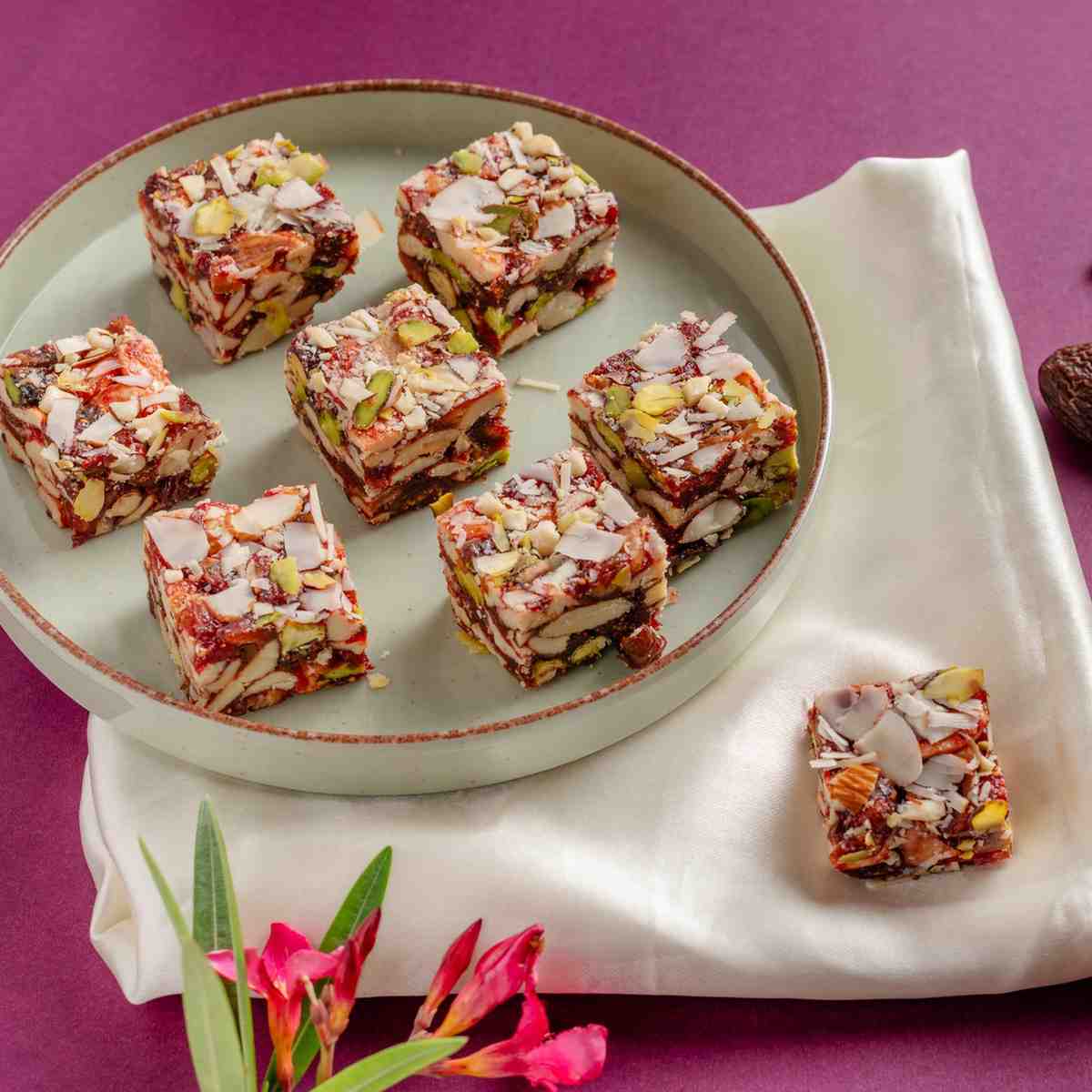 Buy Dry Fruit Barfi online from World of Mysore Pak — filled with kaju, anjeer, and pure ghee in every bite.