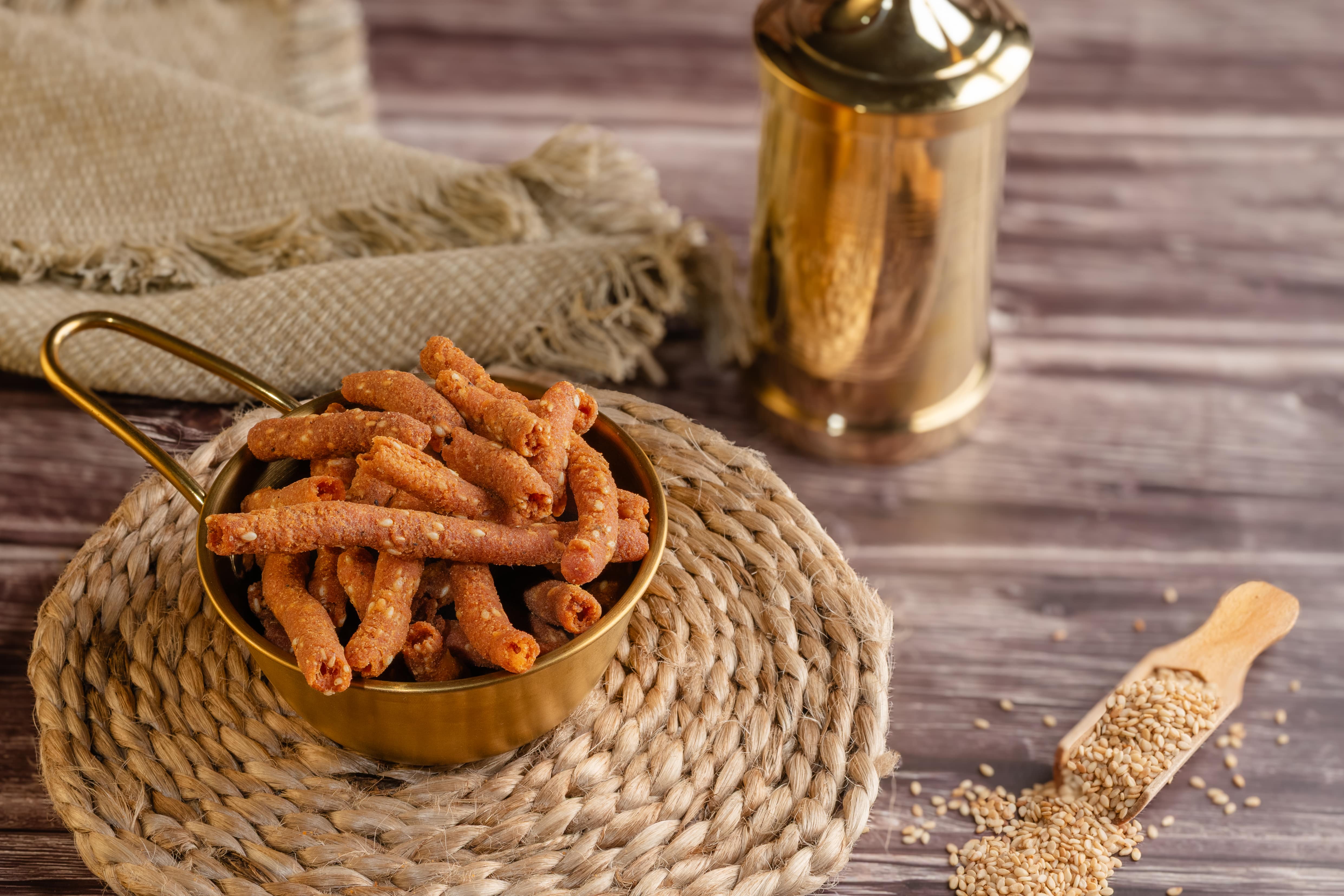 Buy healthy Thil Muruku online from World of Mysore Pak. A flavorful twist on til murukku with ginger, hing, and bold spice.