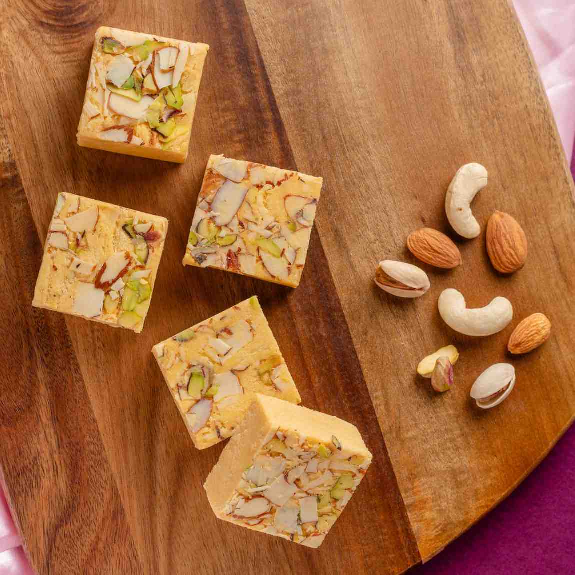 Buy Soan Papdi online from World of Mysore Pak. A flaky sweet made using 100% ghee and sugar.
