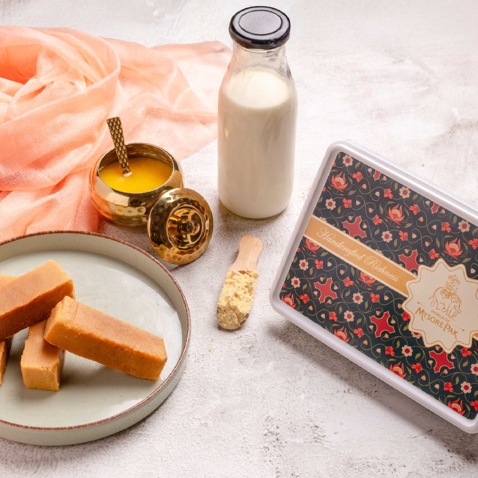 Buy ghee Milk Mysore Pak online from World of Mysore Pak — a traditional Indian sweet infused with milk and pure ghee.