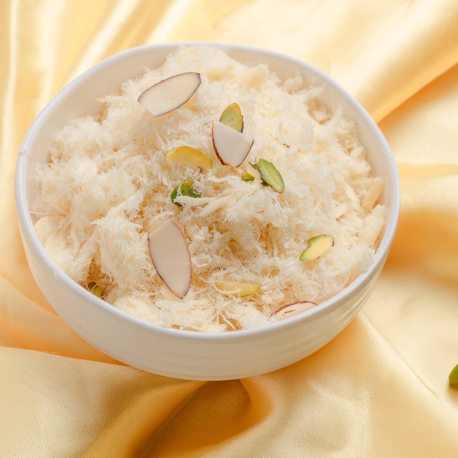 Buy cake-like ghee Soan Cake online from World of Mysore Pak. A soft sweet with pure ghee and delicate texture.