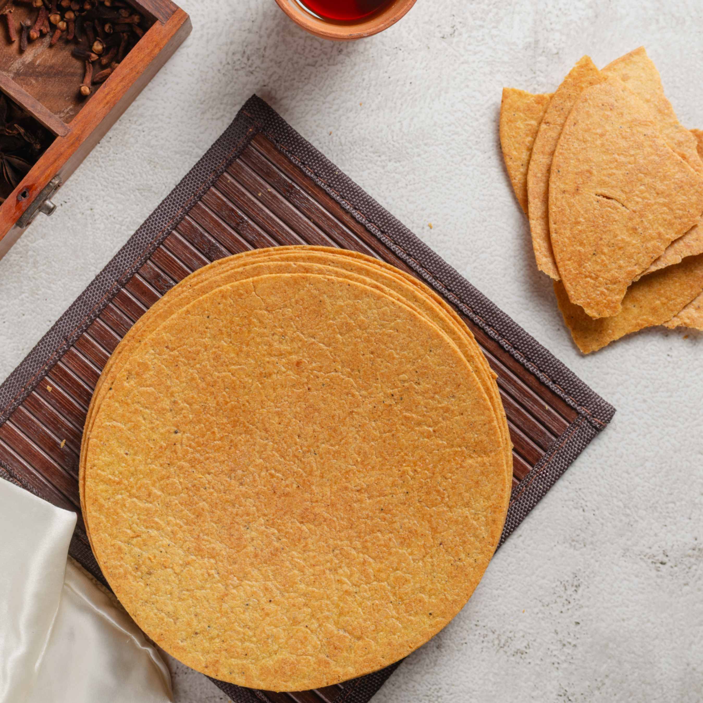 Buy Indian wheat crisps online from World of Mysore Pak – crunchy masala khakhra, spiced and perfectly roasted.