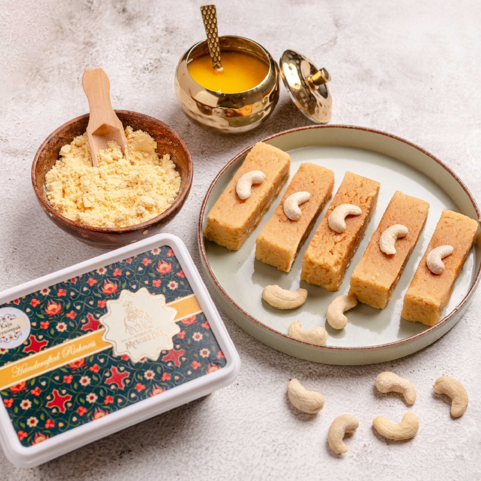 Buy Kaju Mysore Pak online from World of Mysore Pak – creamy cashew & pure ghee blend with rich Mysore Pak flavor.