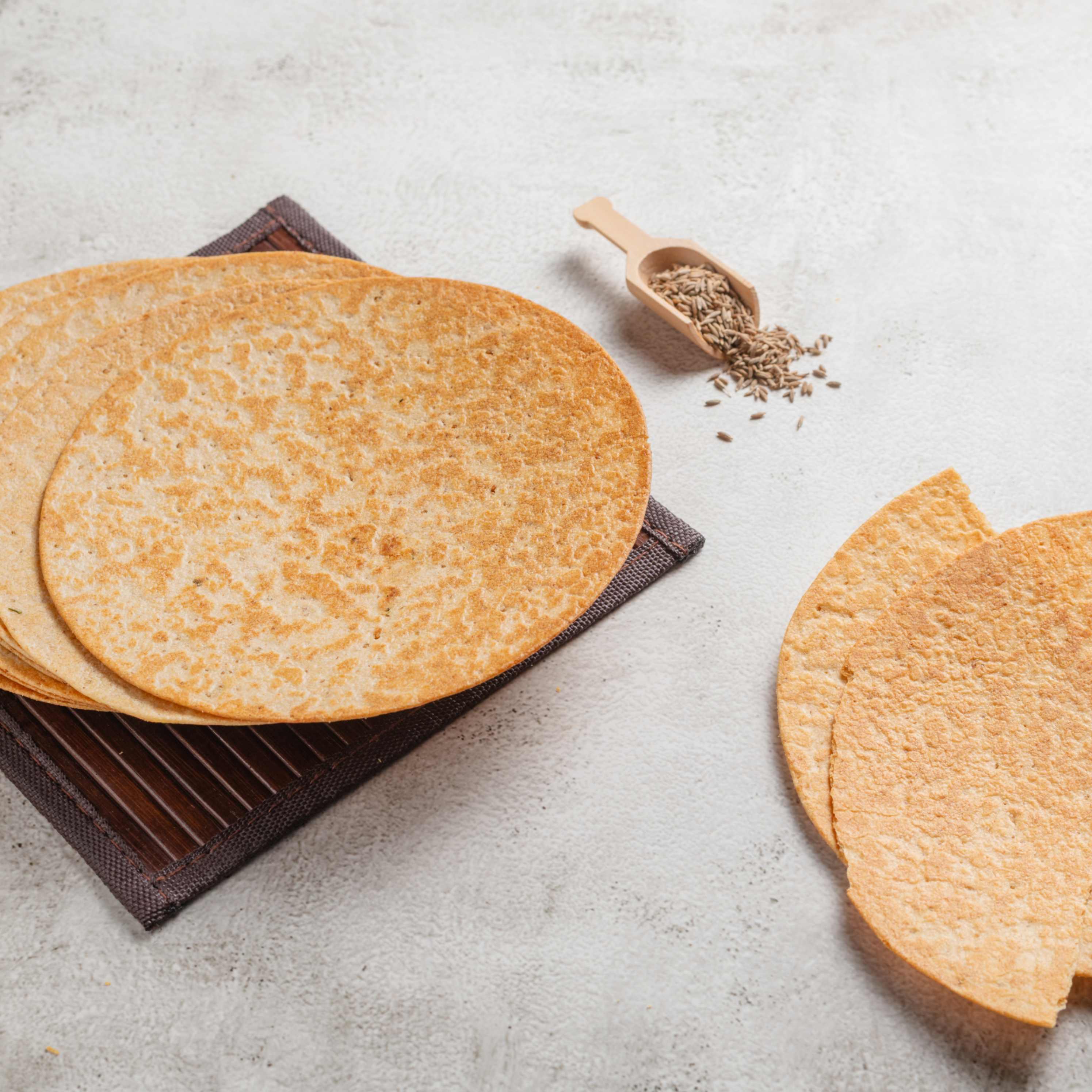 Buy Crisp Khakhra Jeera online from World of Mysore Pak. A tasty snack infused with aromatic cumin seeds.
