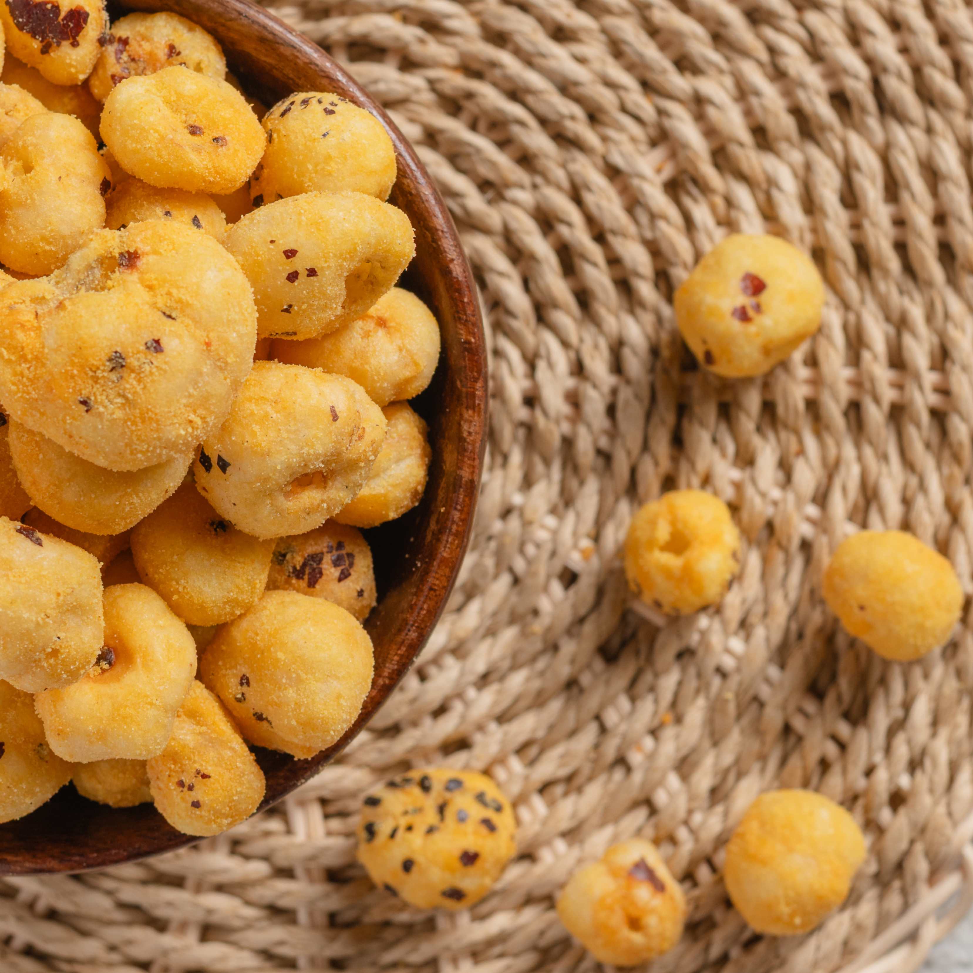 Buy Makhana Cheese snack online from World of Mysore Pak. A light and cheesy treat made with fox nuts and cheddar.