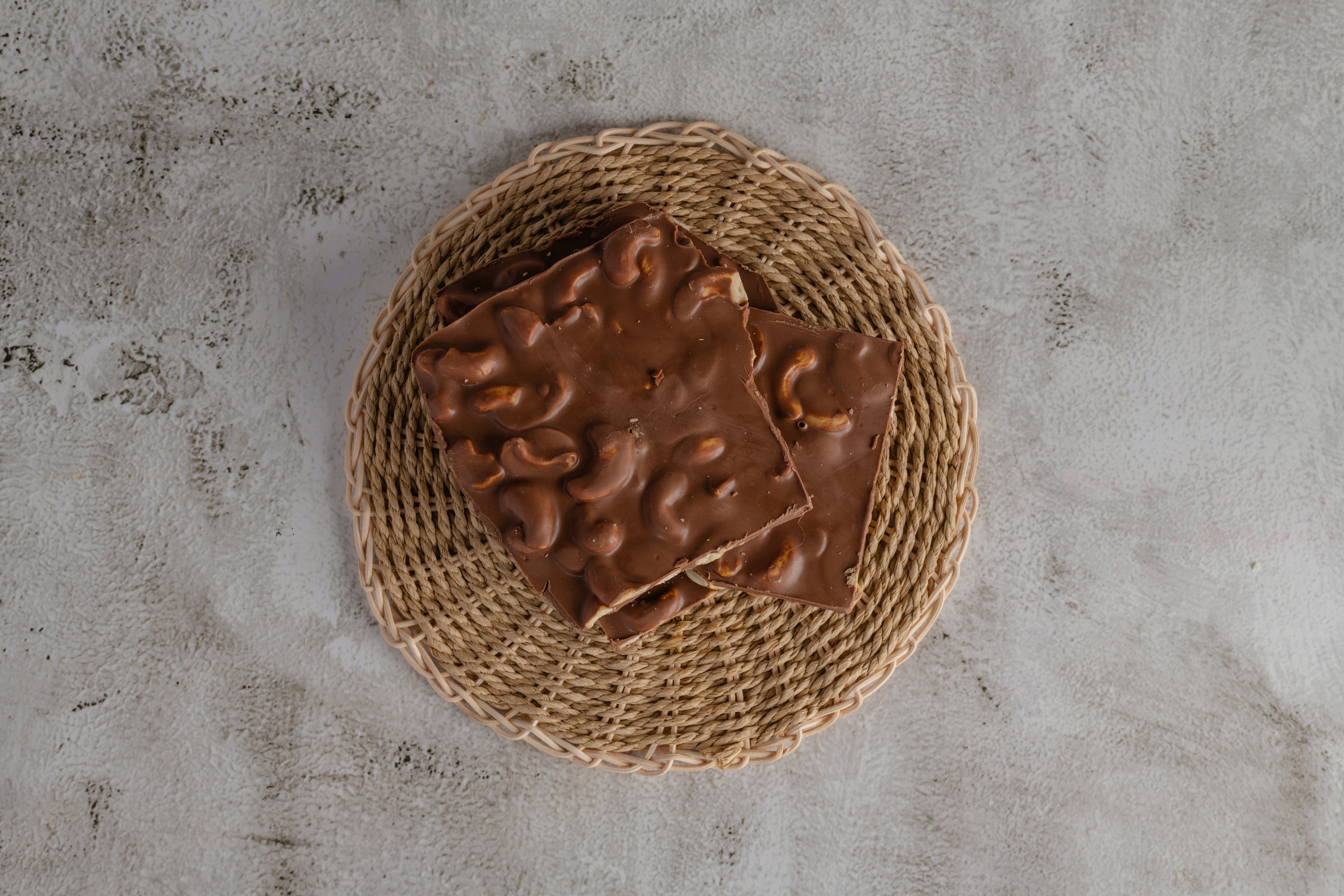 Buy Milk Chocolate cashew combos with mellow sweetness and nutty richness—available online from World of Mysore Pak.