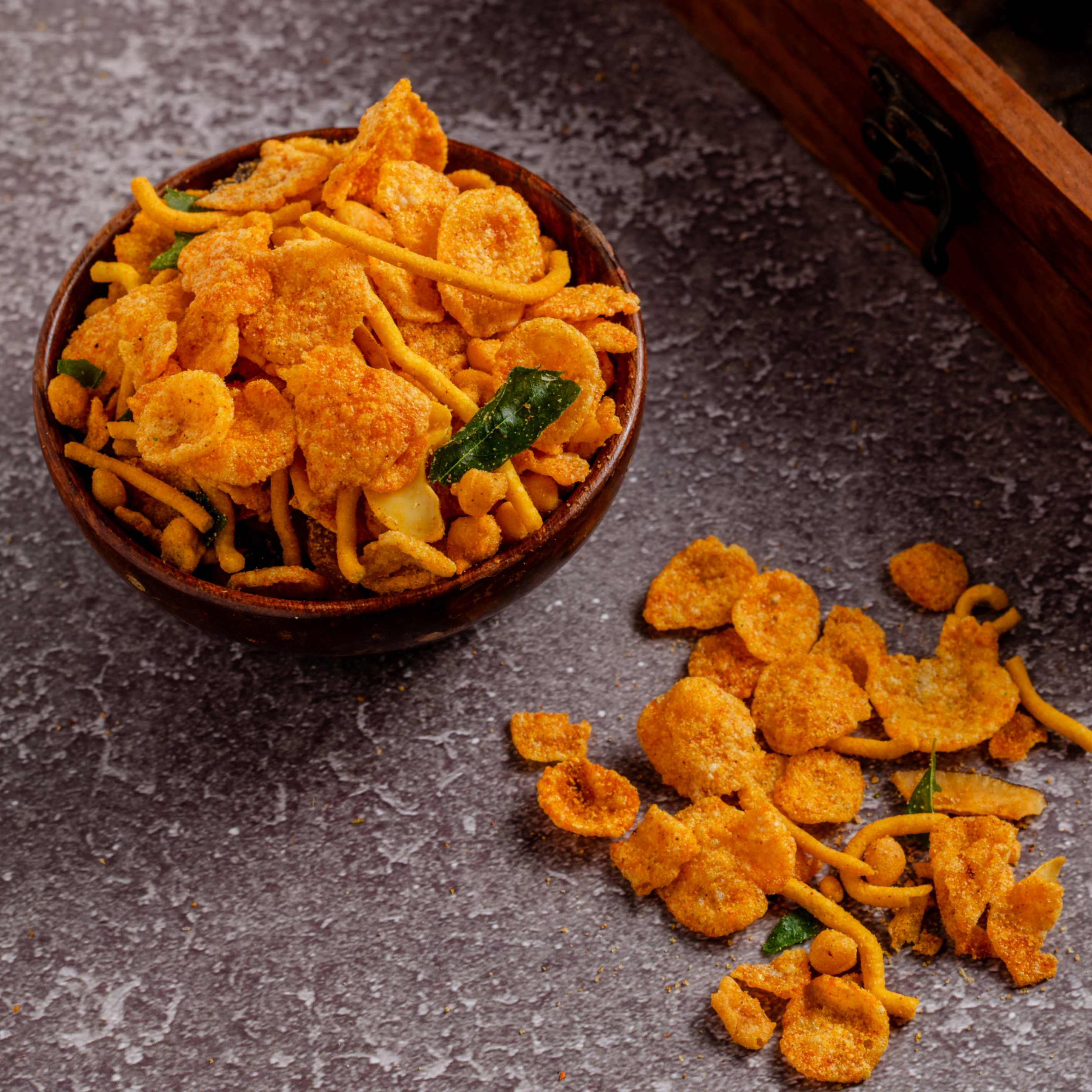 Buy Mysore Mixture online from World of Mysore Pak – crunchy sev, peanuts, and bold Indian spices in every bite.