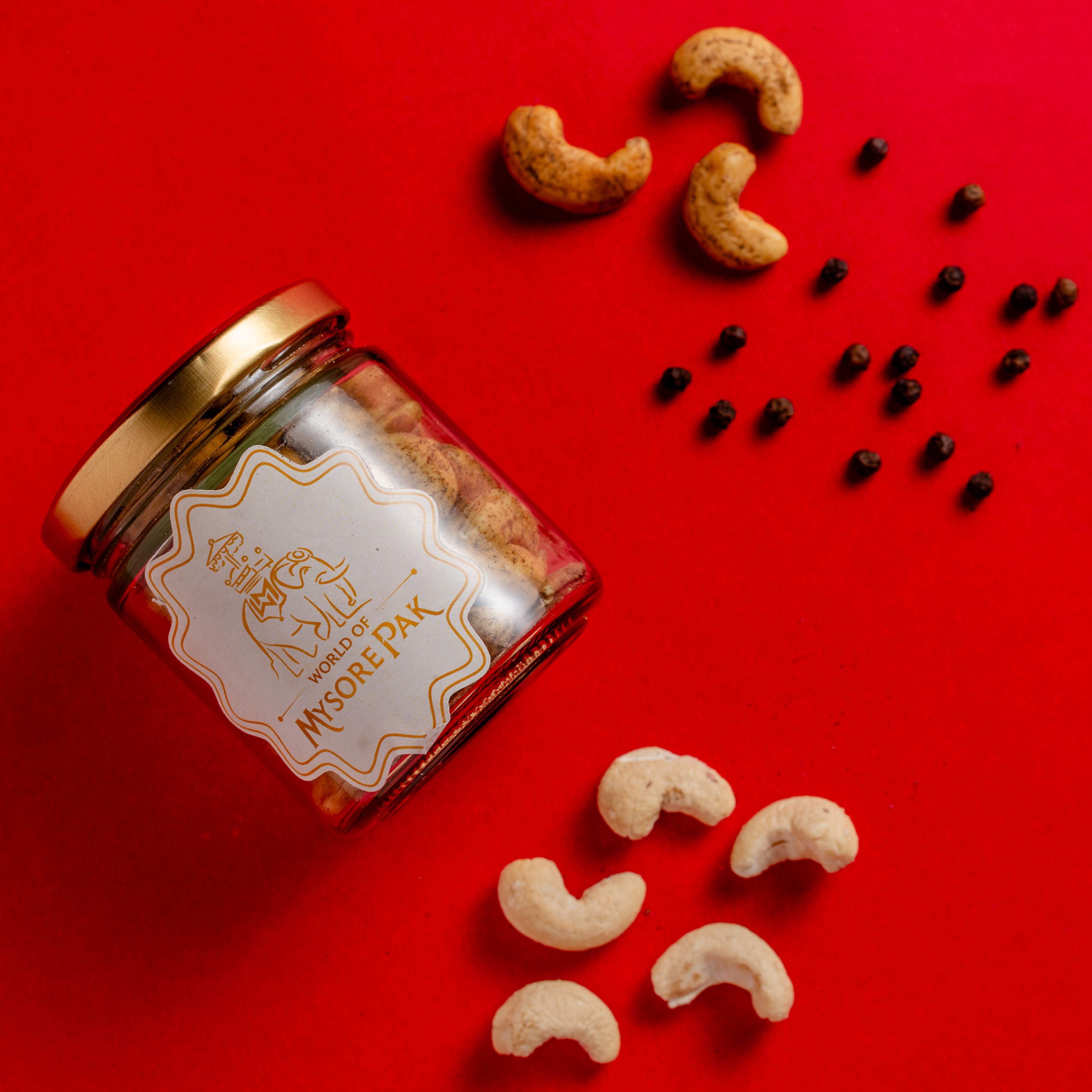 Buy Pepper Cashew Nuts online from World of Mysore Pak. Black pepper cashews with salty, crispy bite.