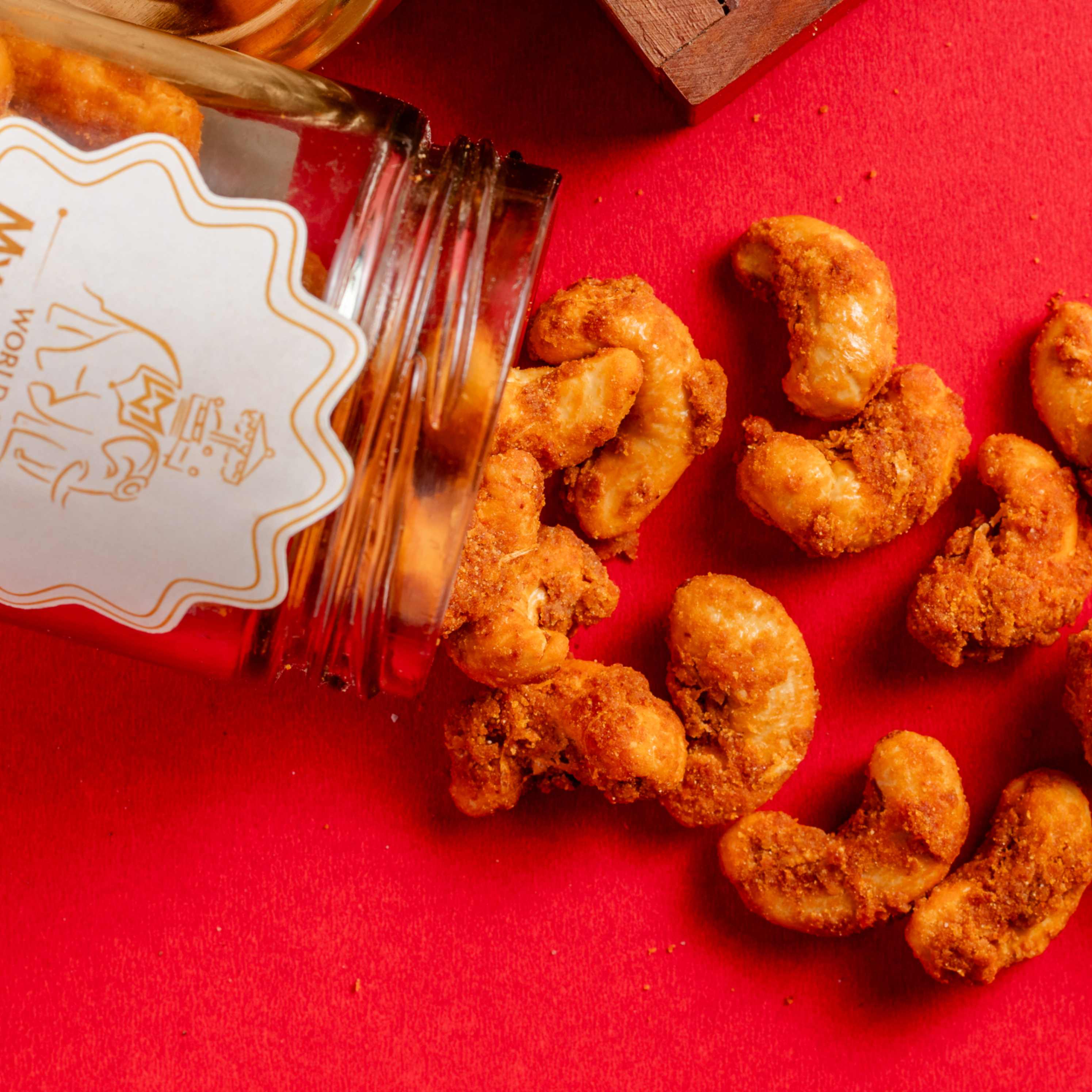 Buy fried Cashew Masala online from World of Mysore Pak. Kaju masala with rich fried masala coating.
