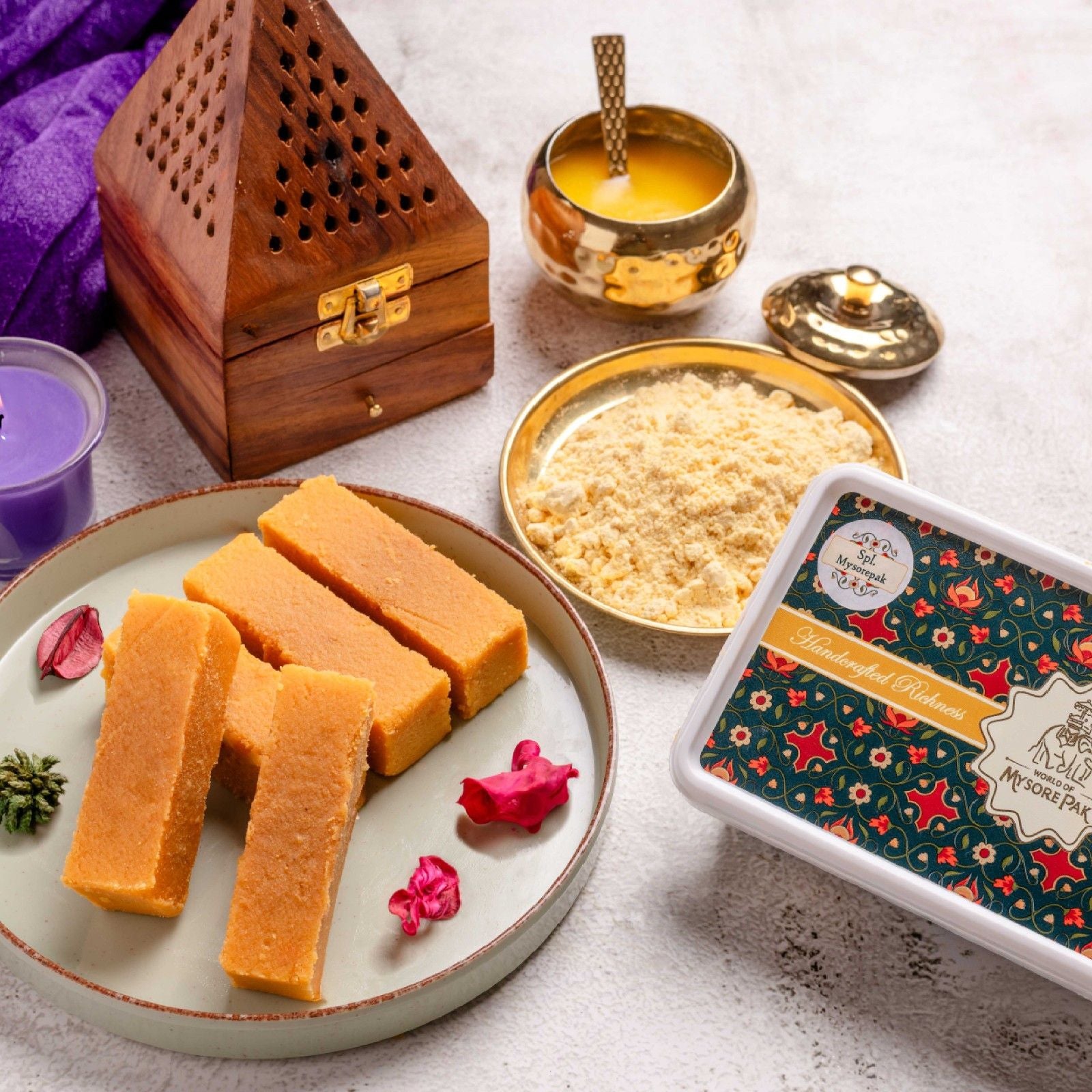 Buy Special Mysore Pak online from World of Mysore Pak – rich Indian sweet made with 100% pure ghee.