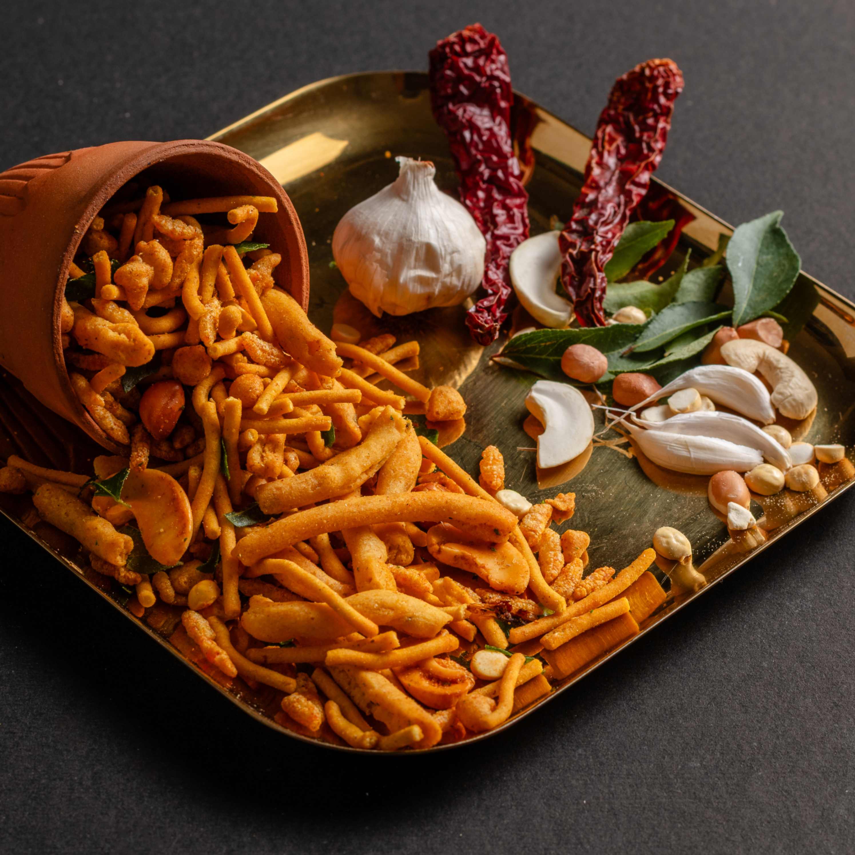 Buy spiced Garlic Mixture online from World of Mysore Pak – bold, tasty, and one of the best garlic mixtures to try.