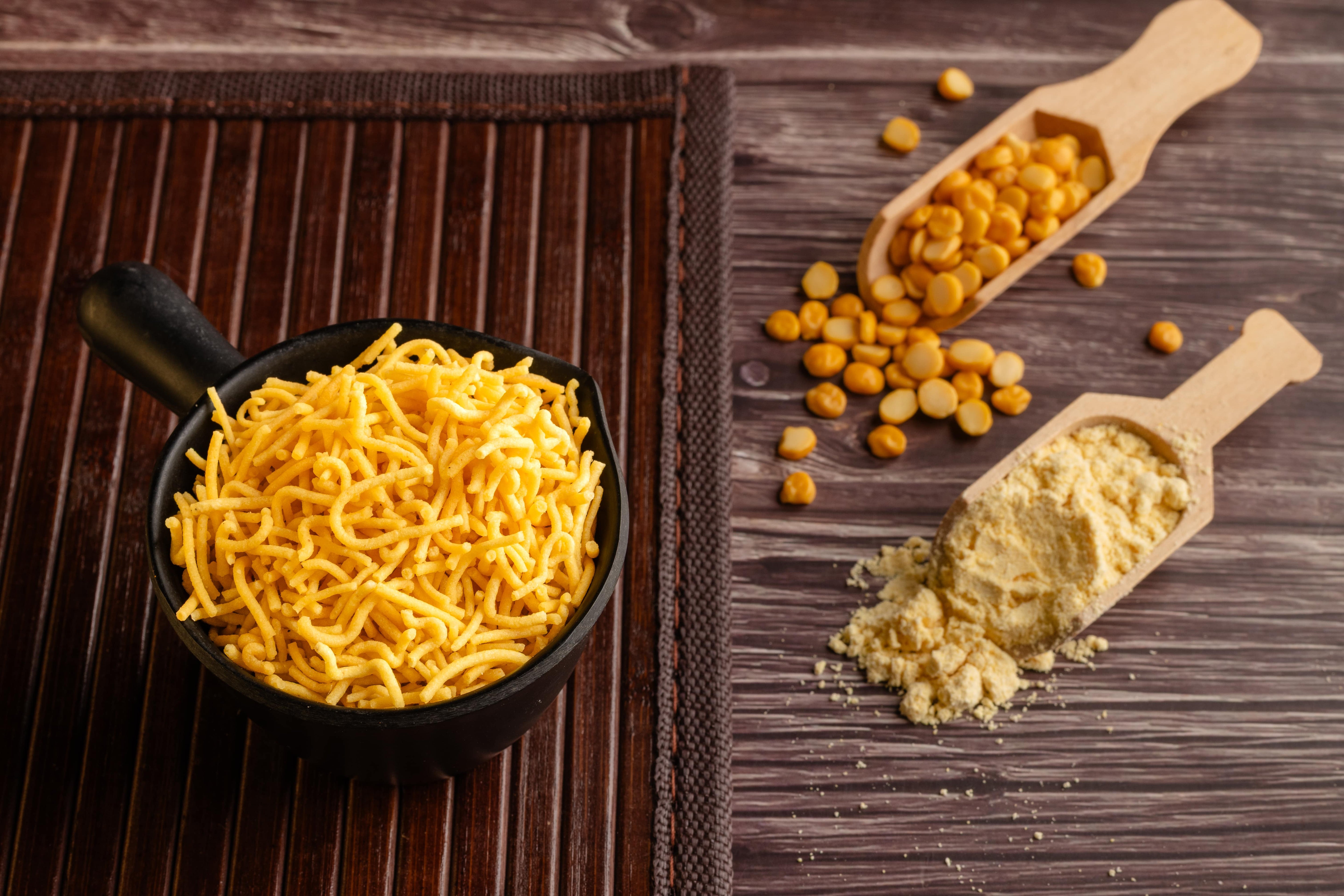 Buy spicy Sev online from World of Mysore Pak. Coated in bold spices, ideal for those who love intense flavor.