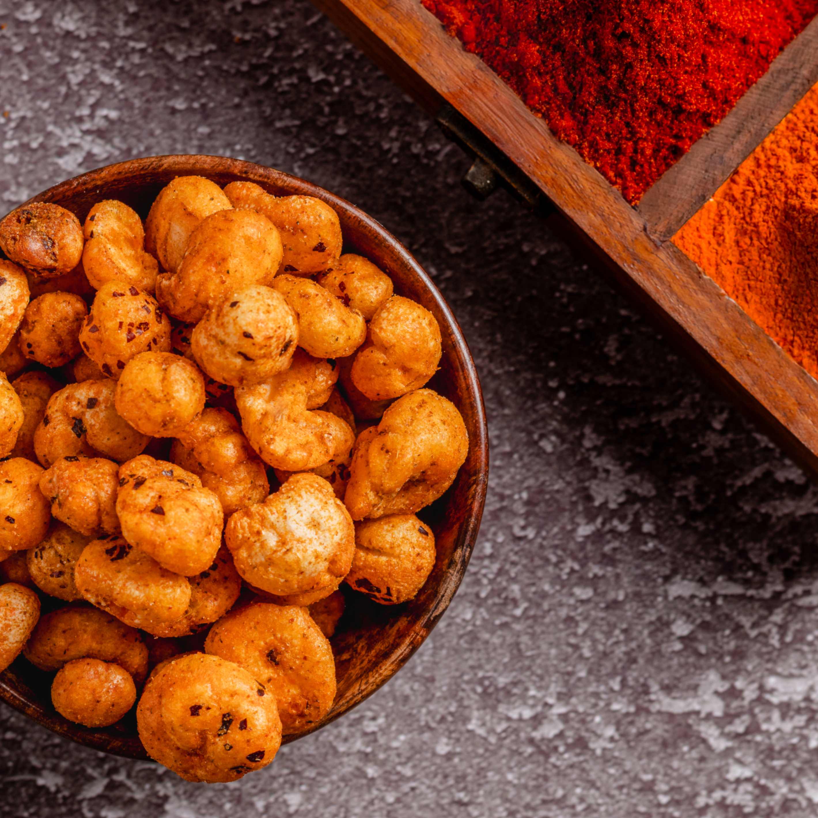 Buy Spicy Lotus Seeds online from World of Mysore Pak. A fiery makhana snack for spice lovers.