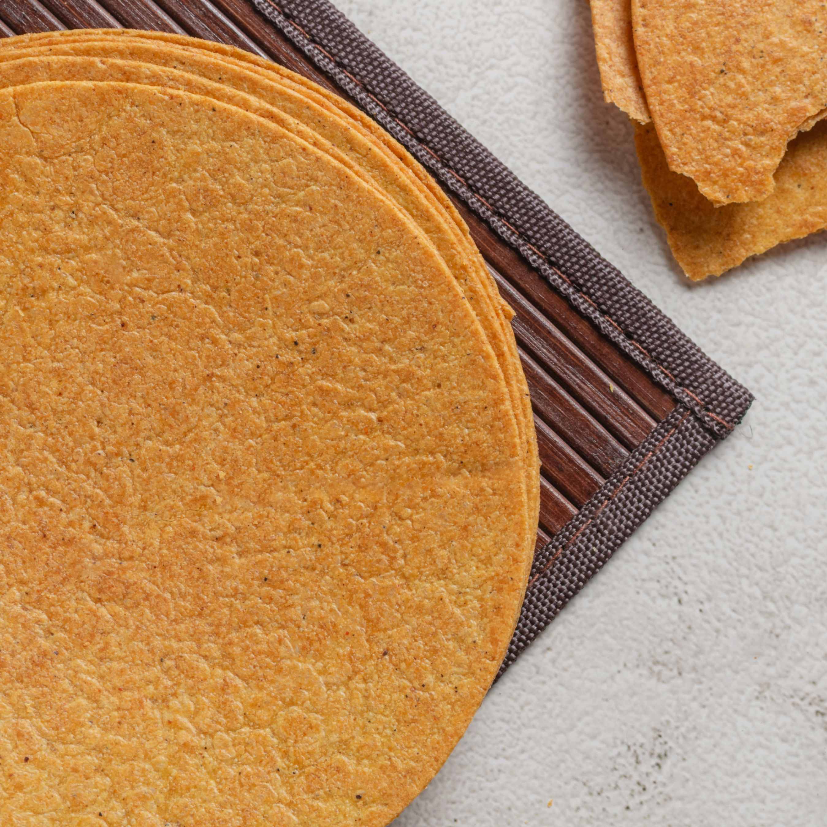 Buy Spicy Masala Khakhra online from World of Mysore Pak – crunchy wheat crisps with a kick of traditional spices.