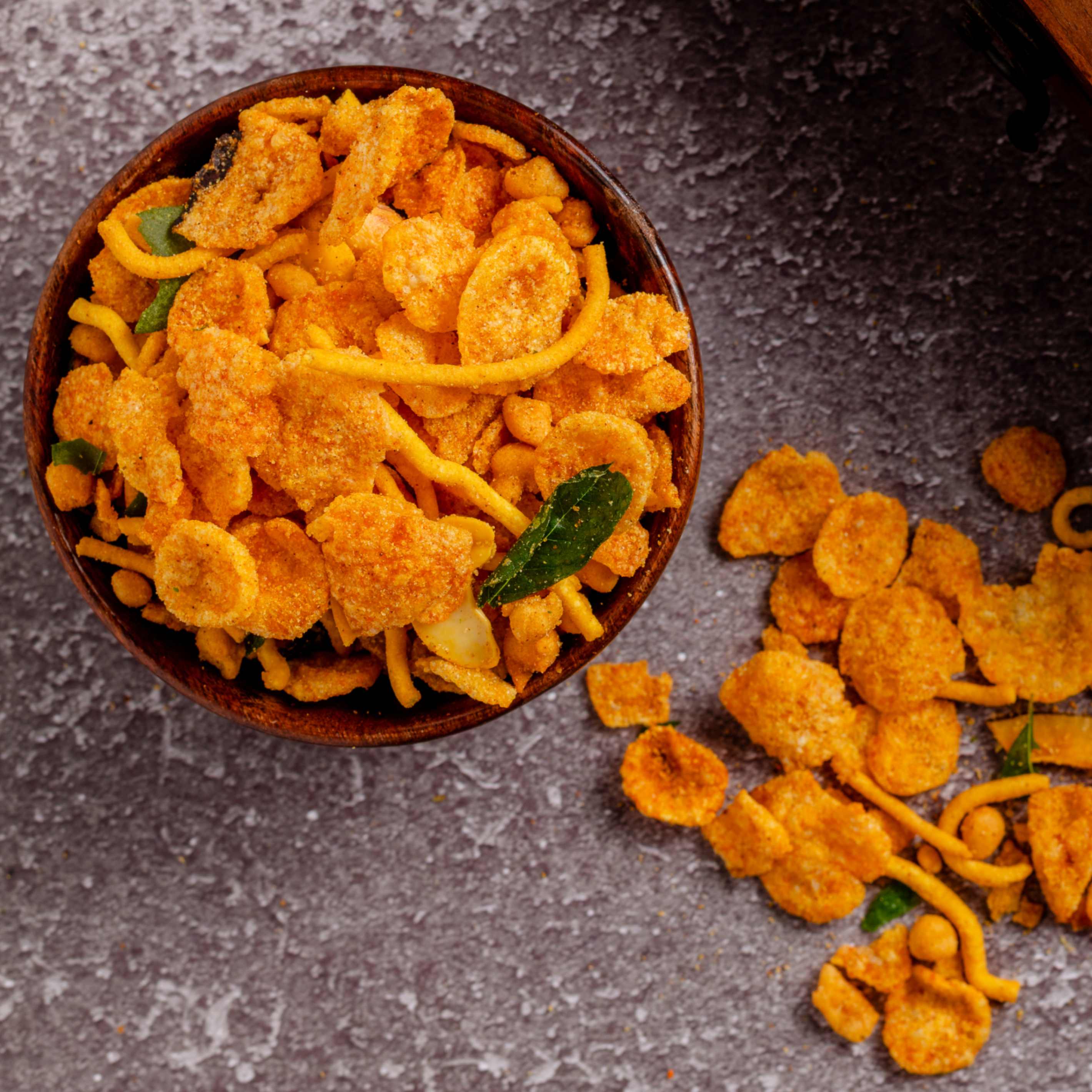 Buy Spicy Mixture snacks online from World of Mysore Pak – sev, peanuts, and fried bits for bold, flavorful bites.