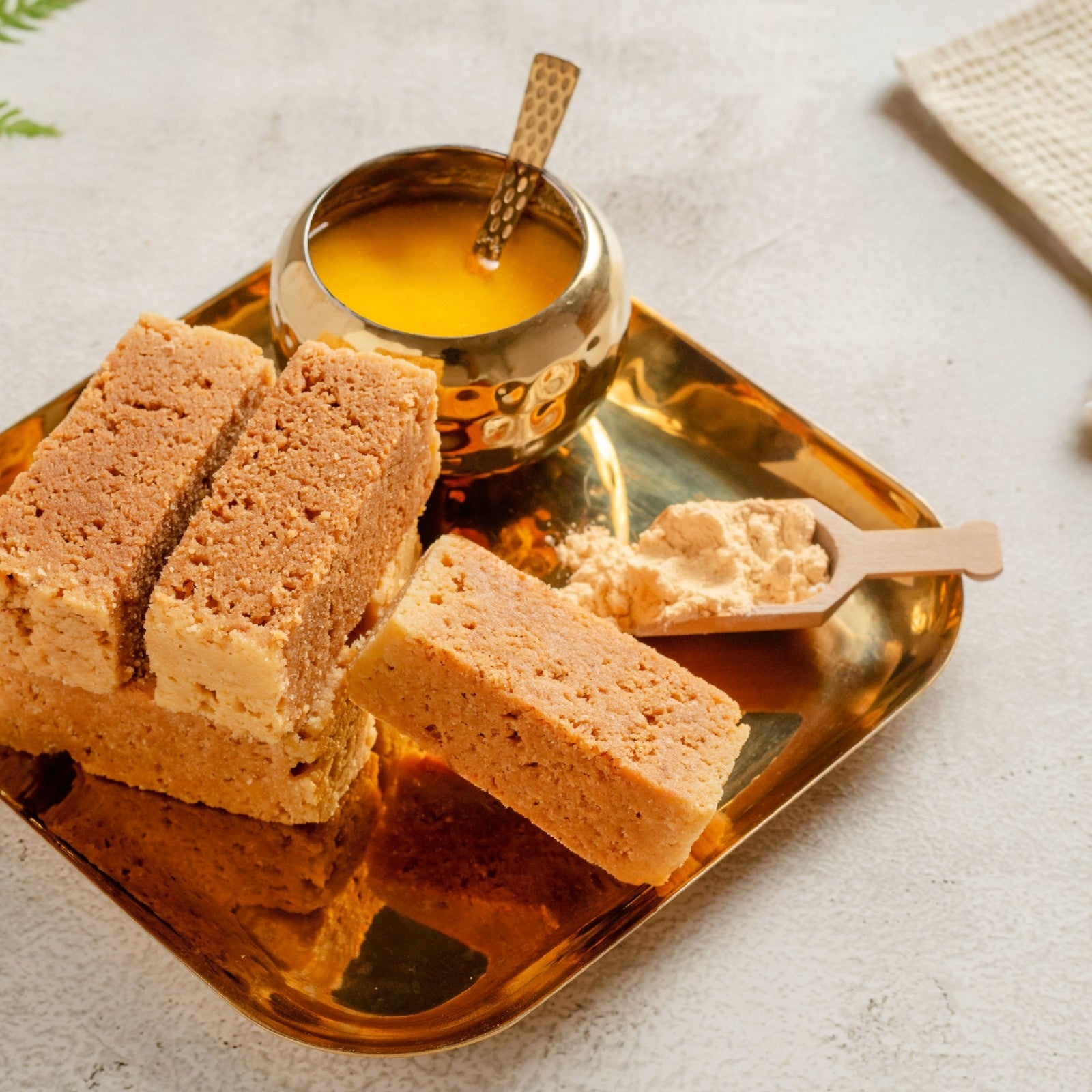 Buy Traditional Mysore Pak online from World of Mysore Pak — a crumbly ghee sweet made with wheat flour.